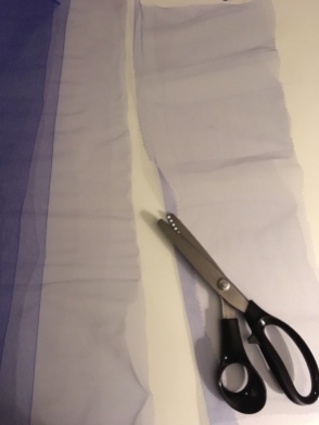 I folded these cut strips in half length wise before I started to work with them and I also trimmed the bottom edge after so the strips can be messy.